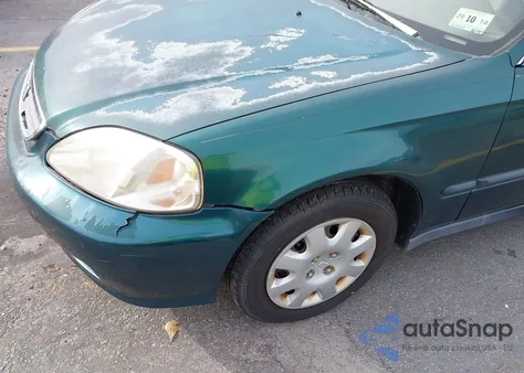 1999 Honda Civic Lx z USA, uszkodzony, nr VIN 2HGEJ6672XH548762